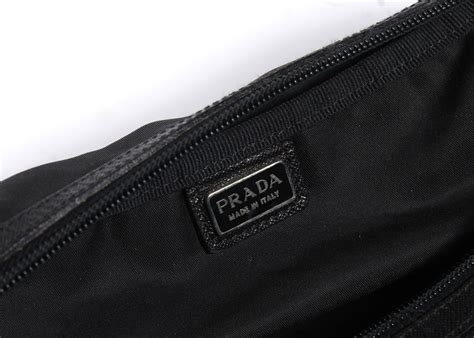 prada milano black clutch|More.